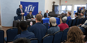 Dean Al Sacco addresses questions at signing ceremony on the LCU campus on April 17, 2015