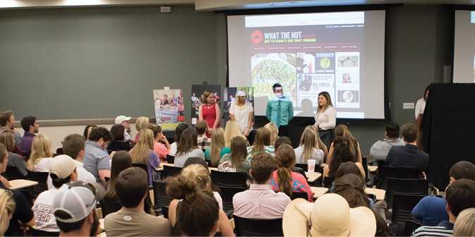 2015 Bullet Advertising Ad Team presenting to students