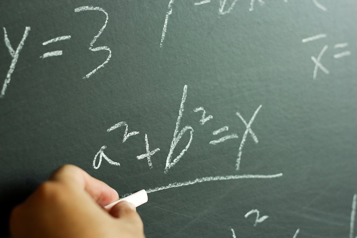 Math equation on a chalkboard