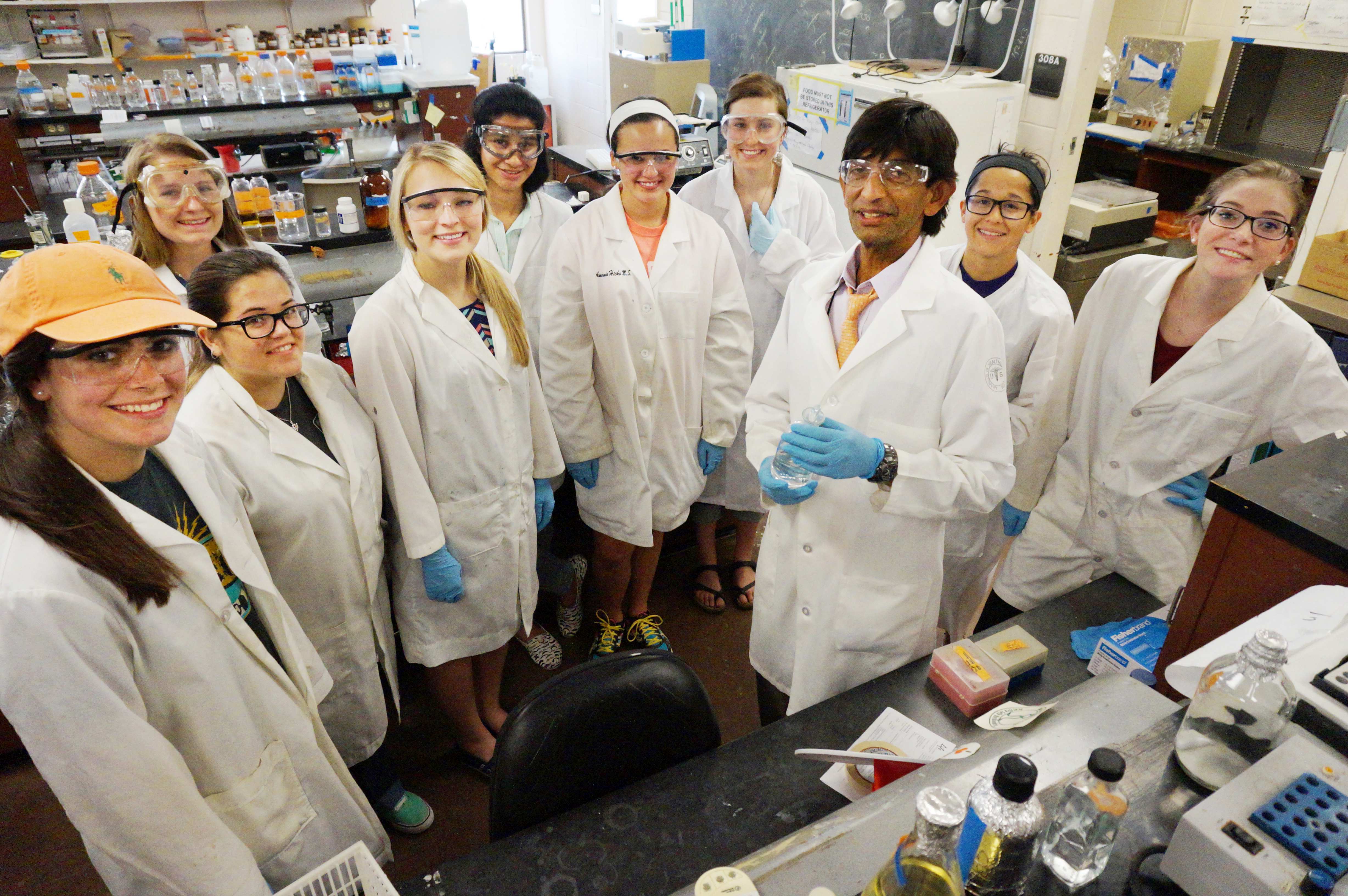 Dr. Sanfrancisco in his lab with students