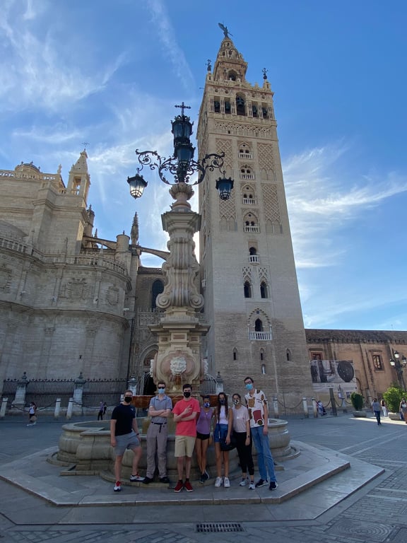 Students standing in front of the Cathedral of Sevilla