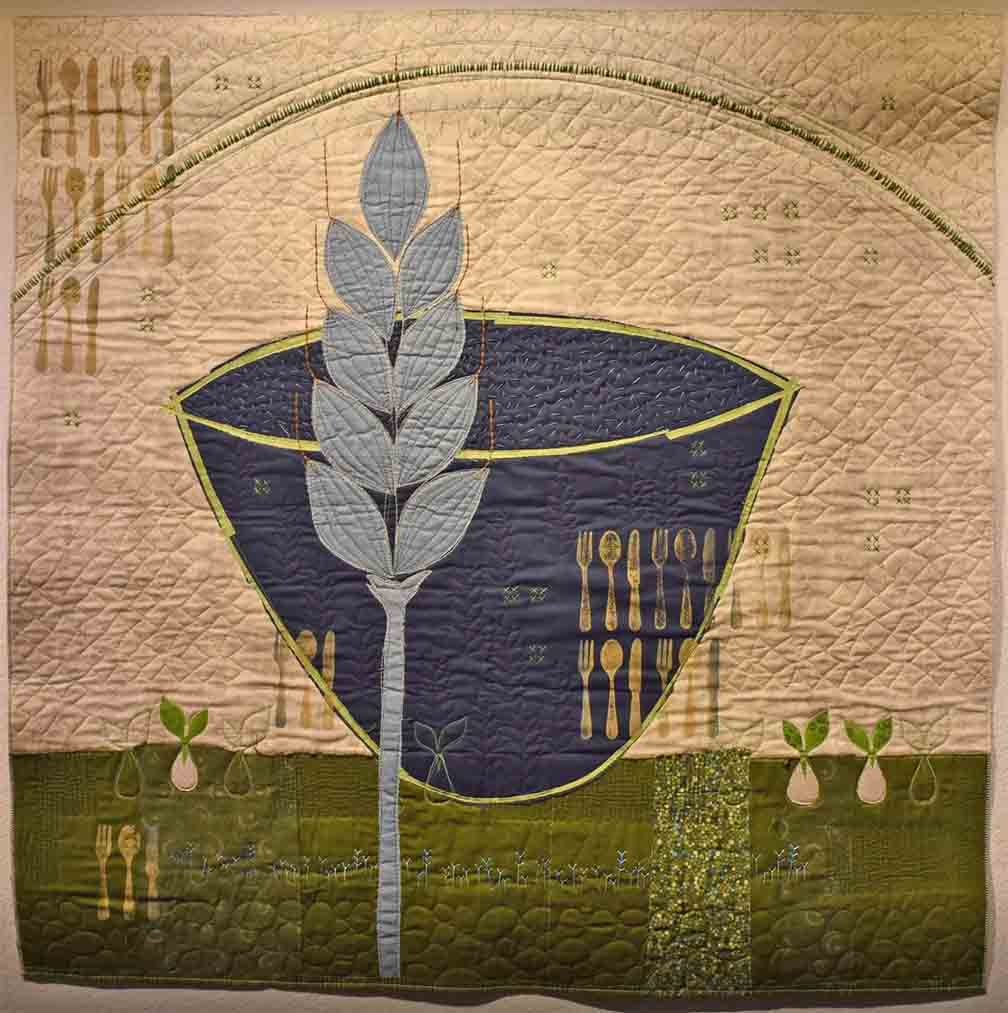 art quilt with small bowl and wheat stalk 