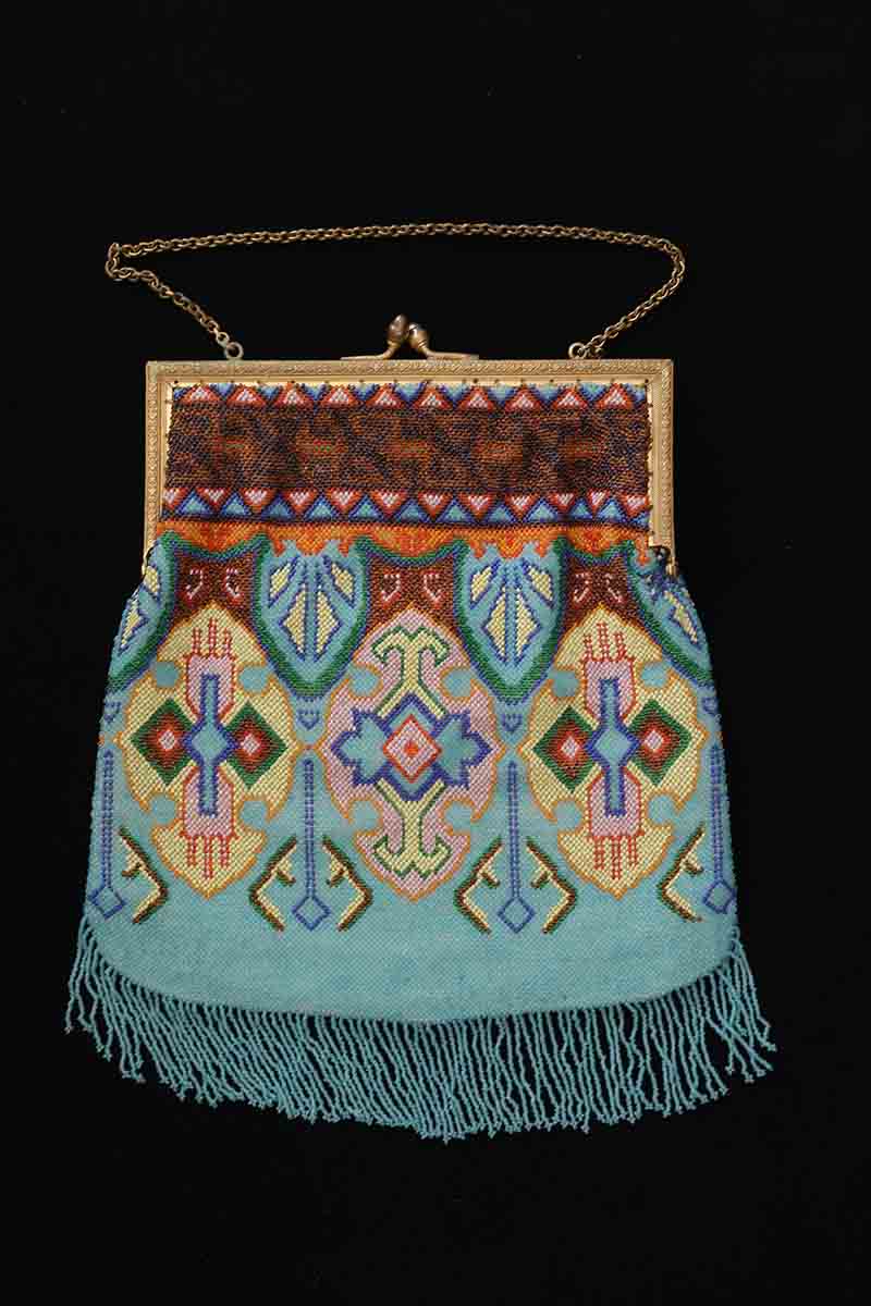Aqua Colored Beaded Purse given to Ruth Bryant (Mrs. Harold) by a young French Chasseur in 1917, Gift of Ruth Bryant (Mrs. Harold), TTU-H1967-056-011.