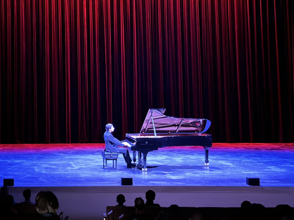 Image of a pianist playing the piano