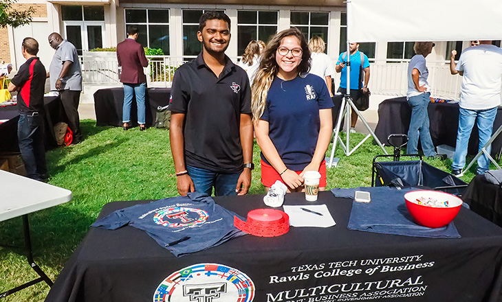 Two students from multicultural student business association