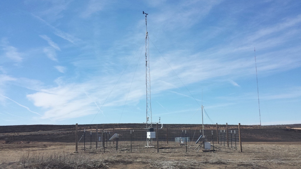 mesonet surrounded by burned pasture