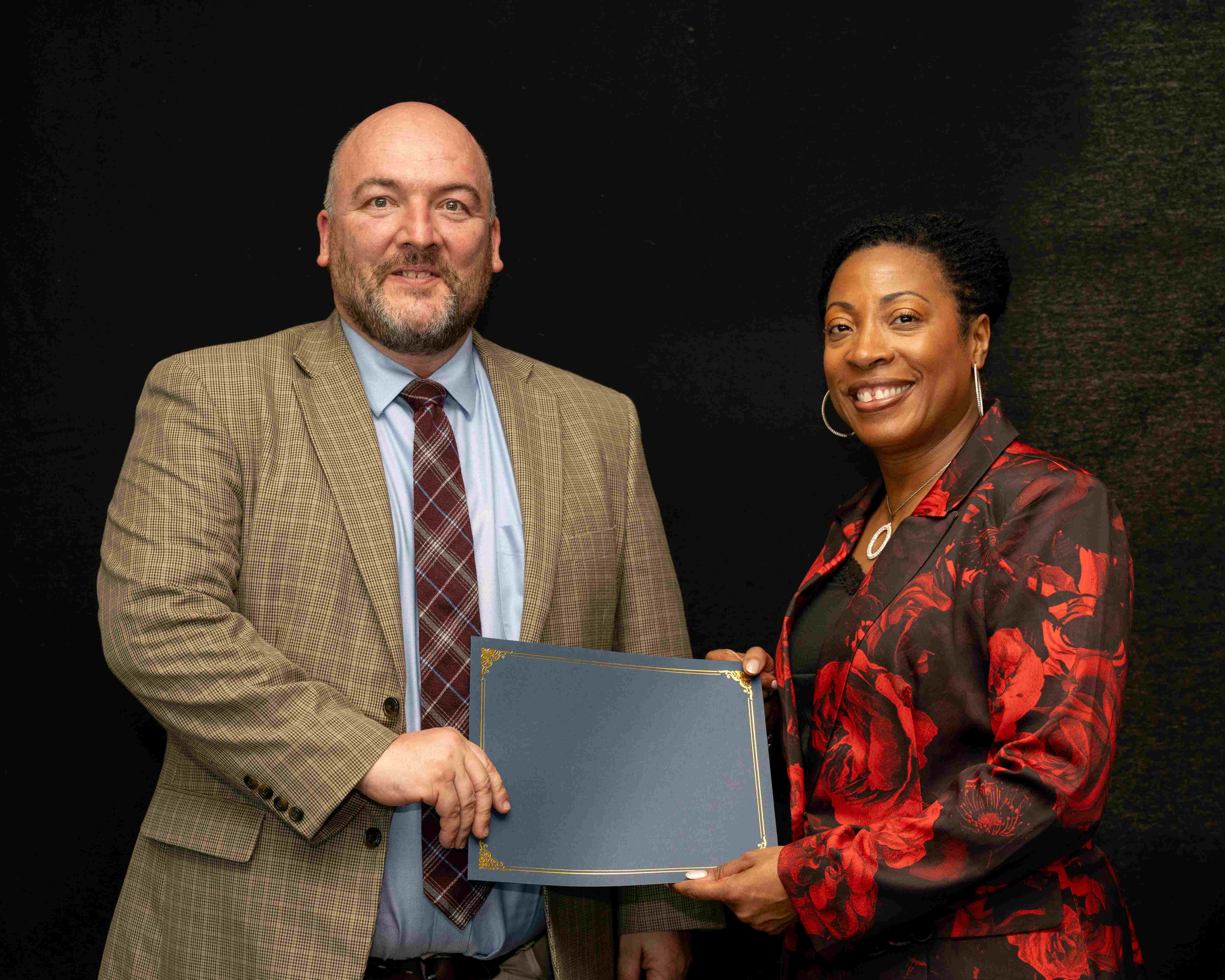 Anthony Newberry of Seminole High School receiving the Helen I. Medley Award.