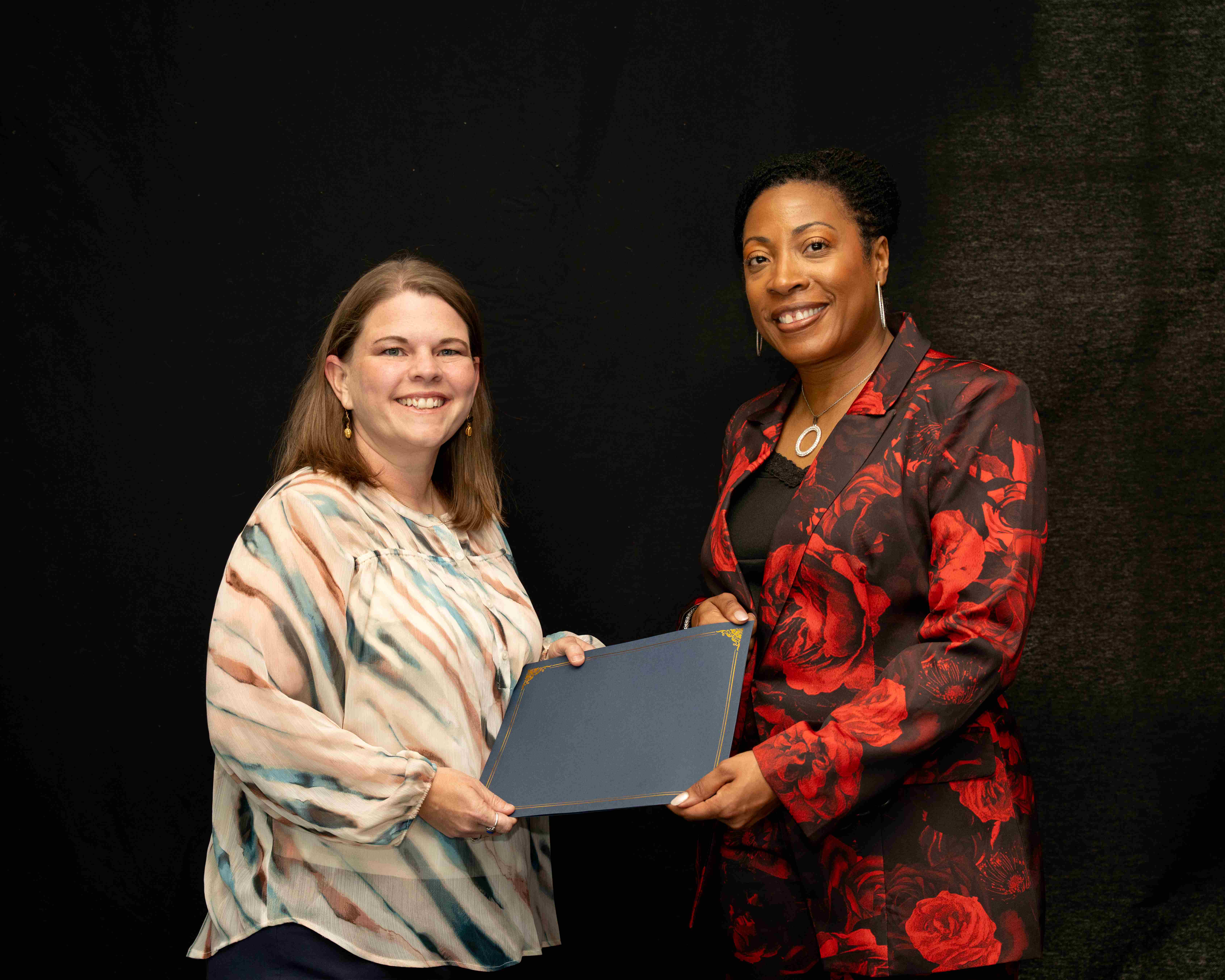 Laura Lewis of New Deal ISD receiving the Helen I. Medley Award.