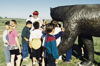 Volunteer interpreter leading a public program