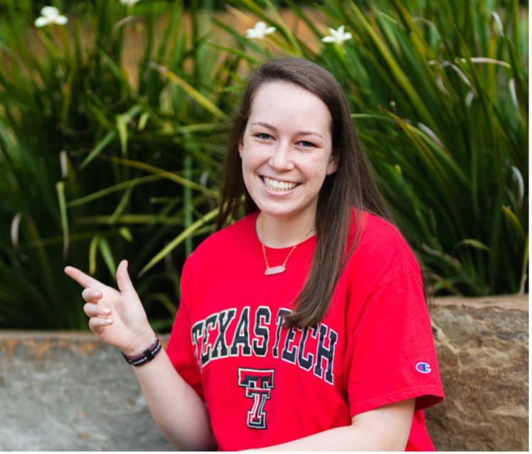 Female in red TTU shirt