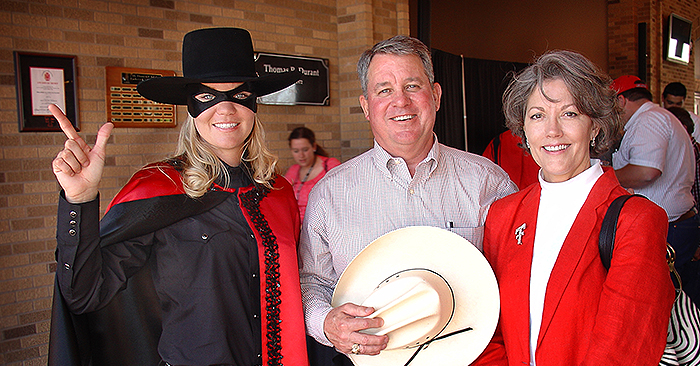 Gerald and Debbie Nobles and masked rider