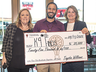 3 People Holding Big Check