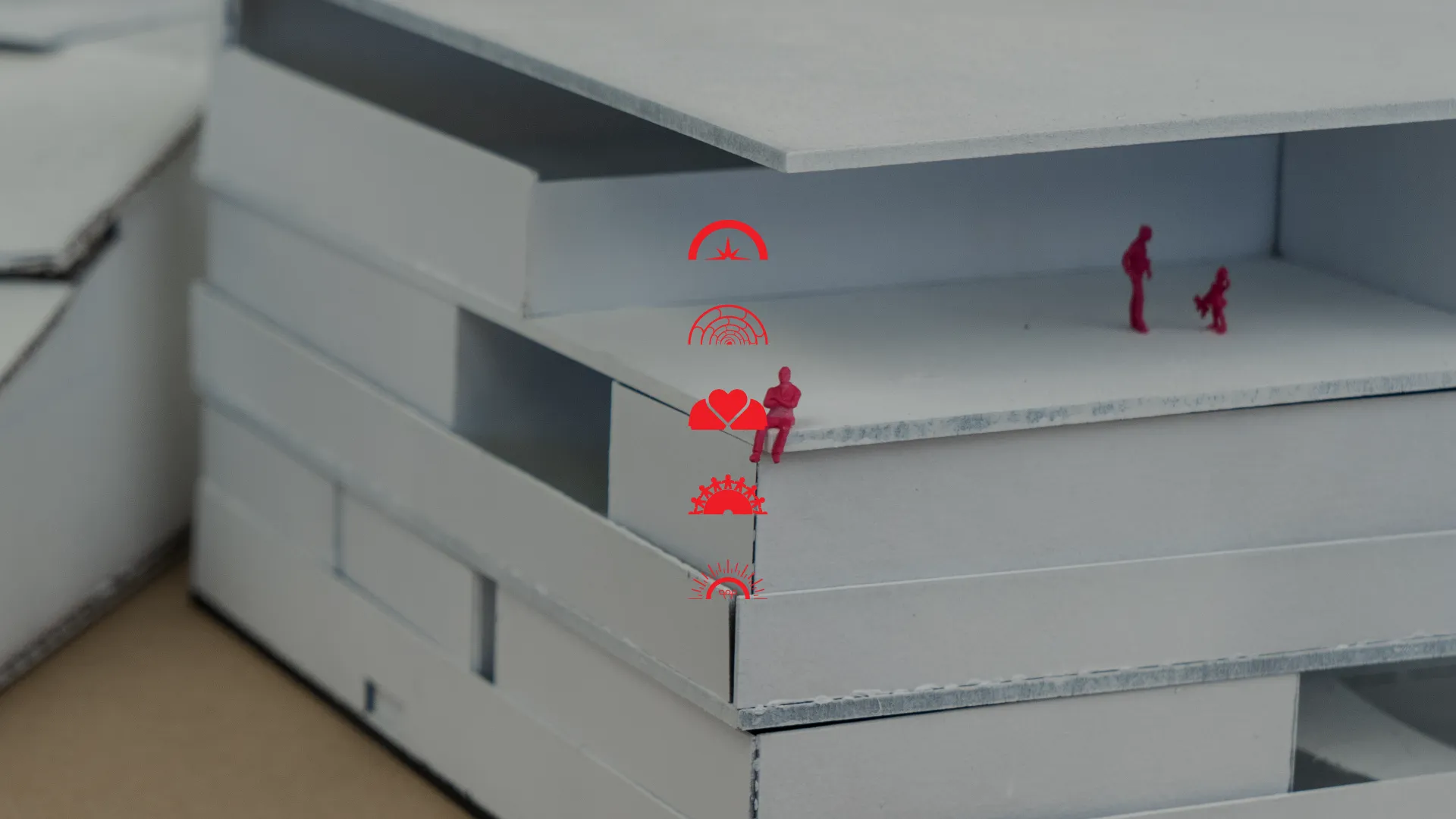 A student's model with small 3D printed people for scale.