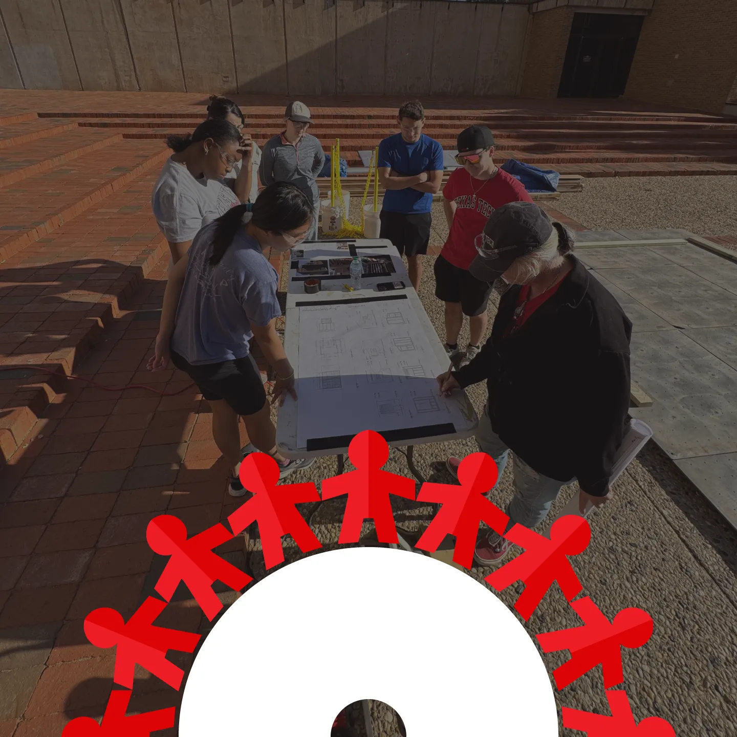 Paper people coming together.