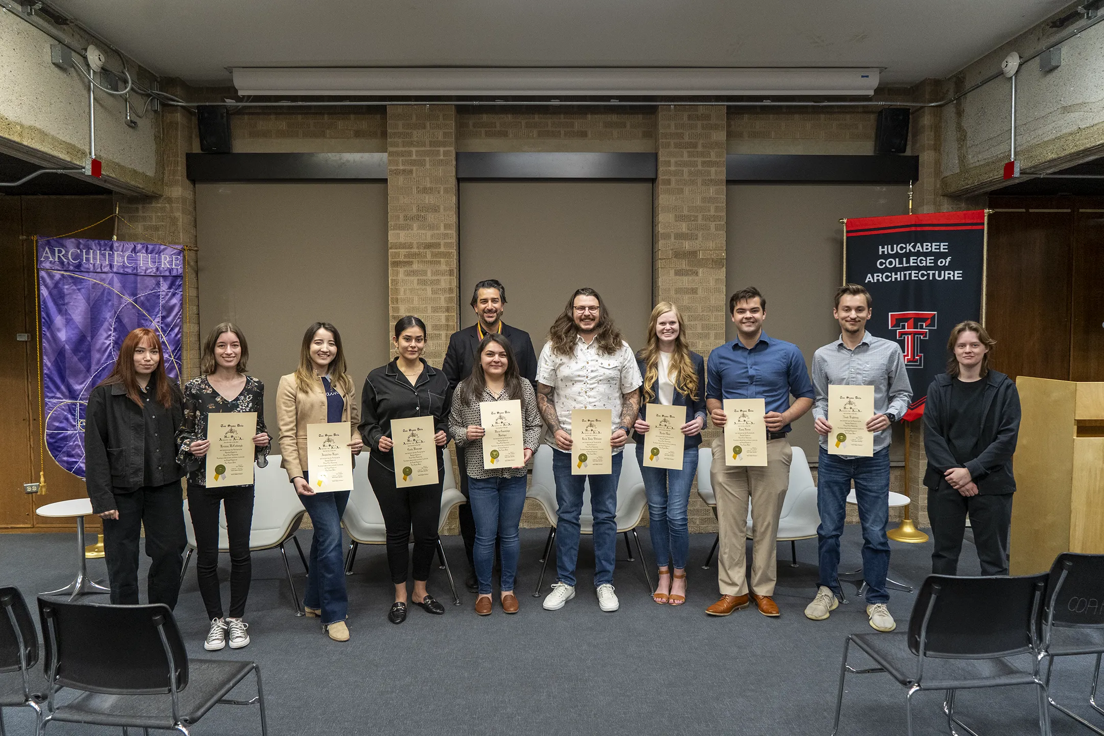 Tau Sigma Delta 2023 recipients posing with their award certificates.