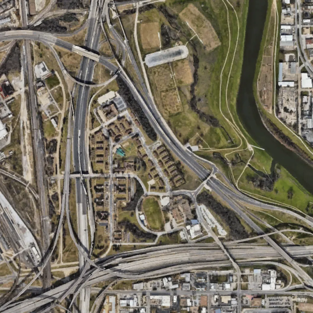 Overhead photo of a road and neighborhood.