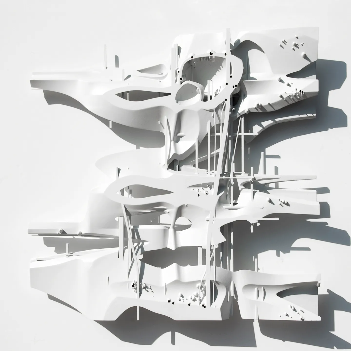 A grid of images show models, drawings, and other plans.