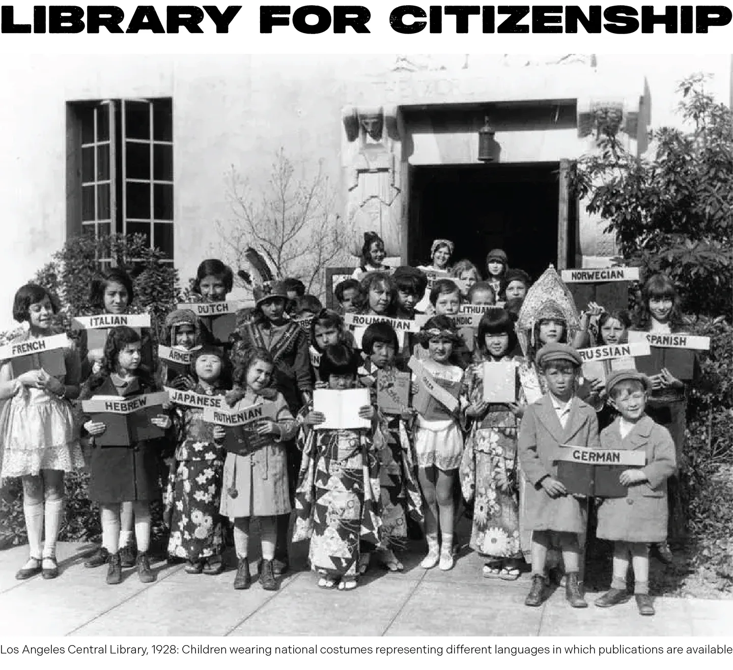 A photo of children wearing international costumes in from of the Los Angeles Library in 1928