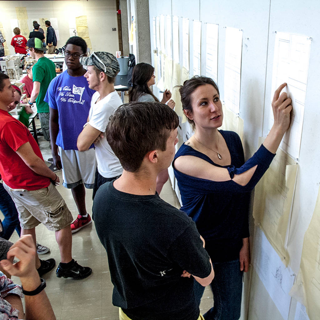 Students gathered for a design presentation.