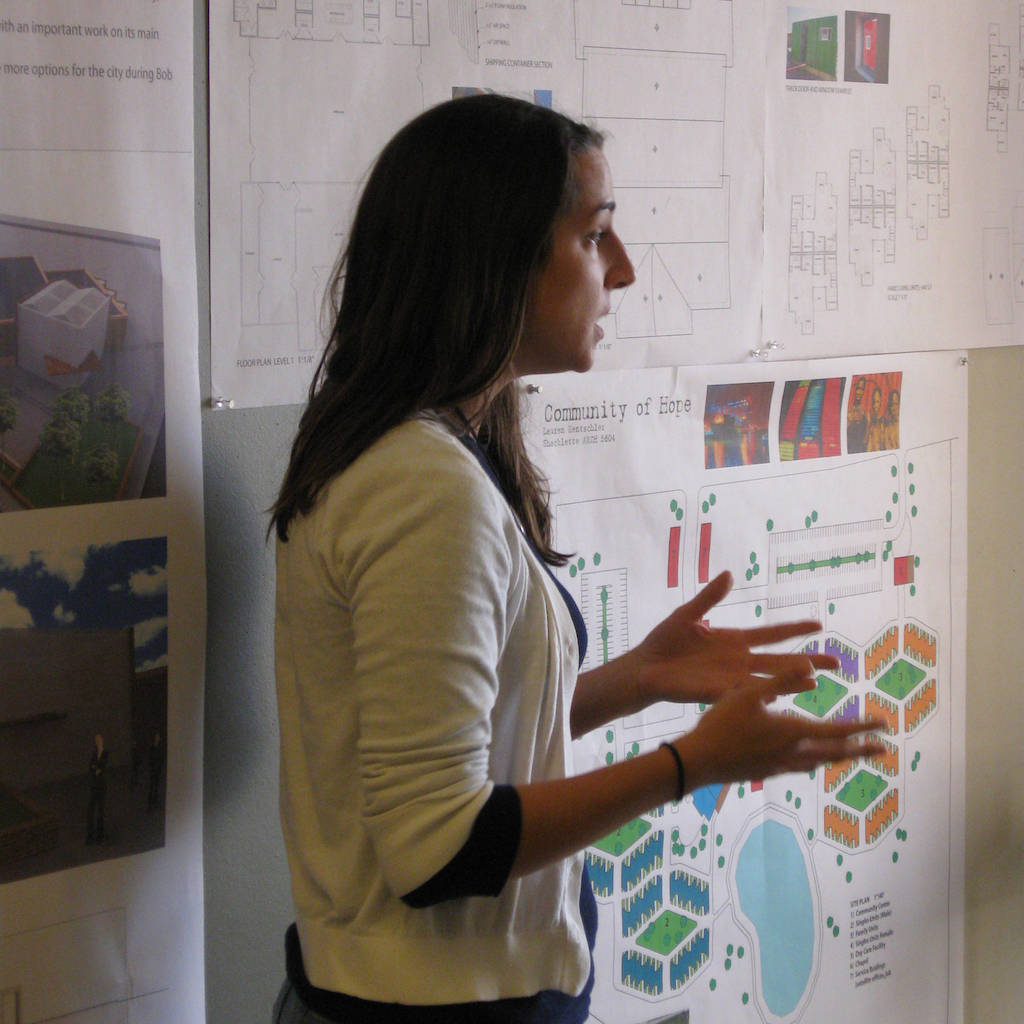 Student explaining details of design piece.