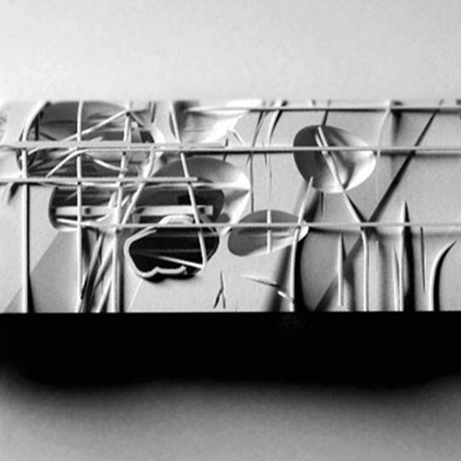 Grey-scale photo of abstract sculpture.