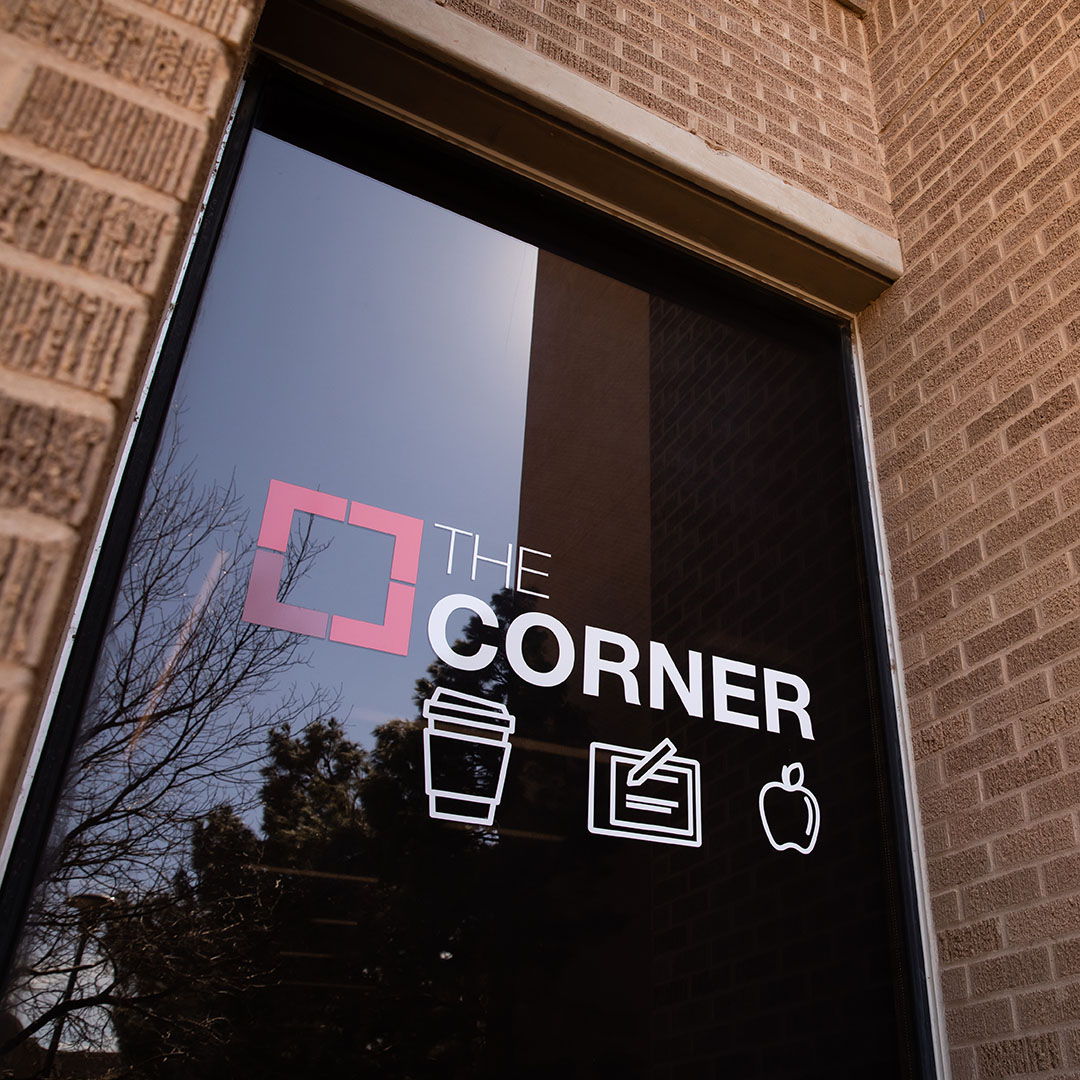 View of The Corner's vinyl decal from outside of the south entrance.