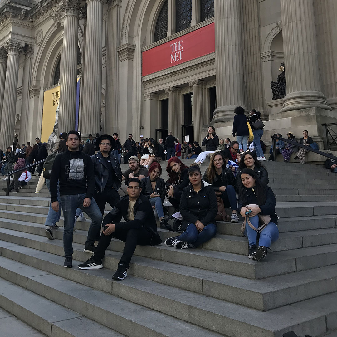 Students sitting outside the Met