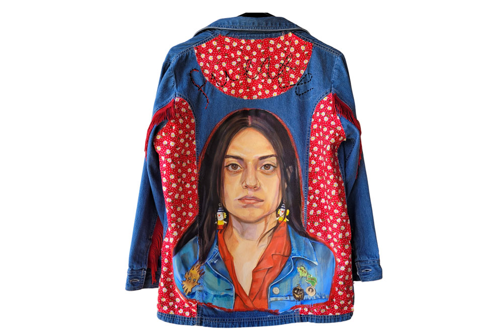 Jean jacket with woman's picture on back
