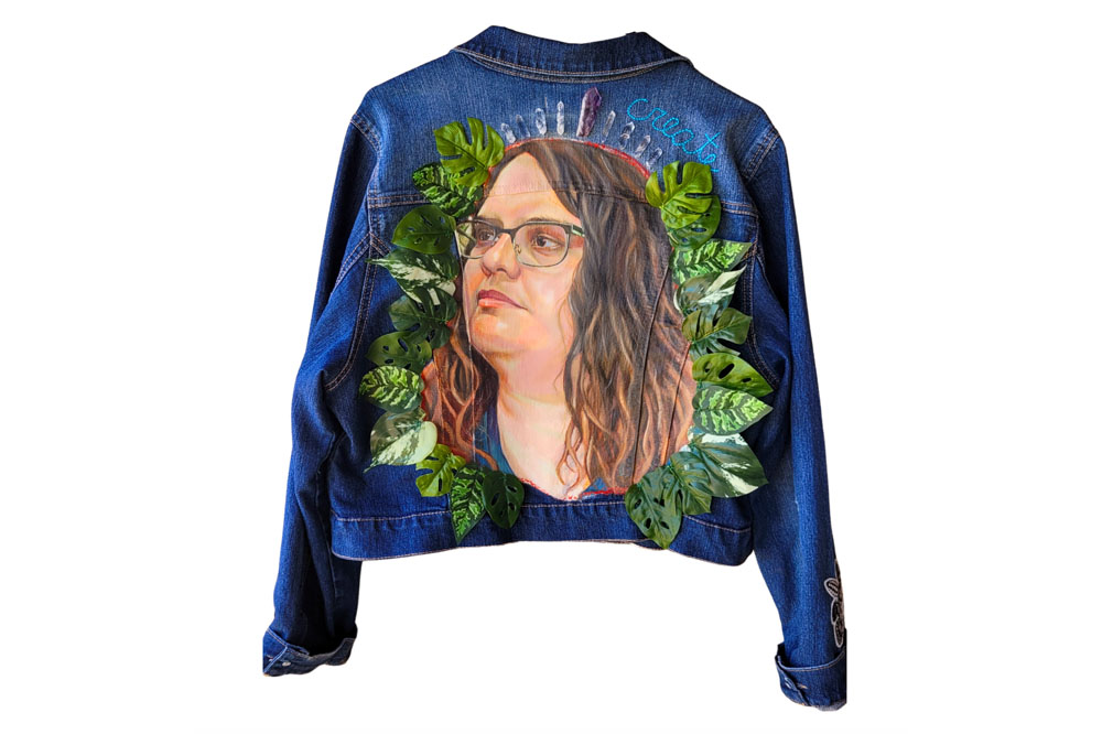 Jean jacket with woman's picture on back