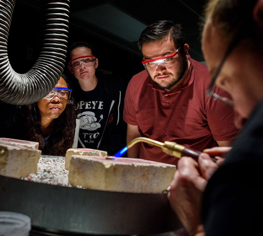 Prof Rob Glover demonstrates soldering to his class