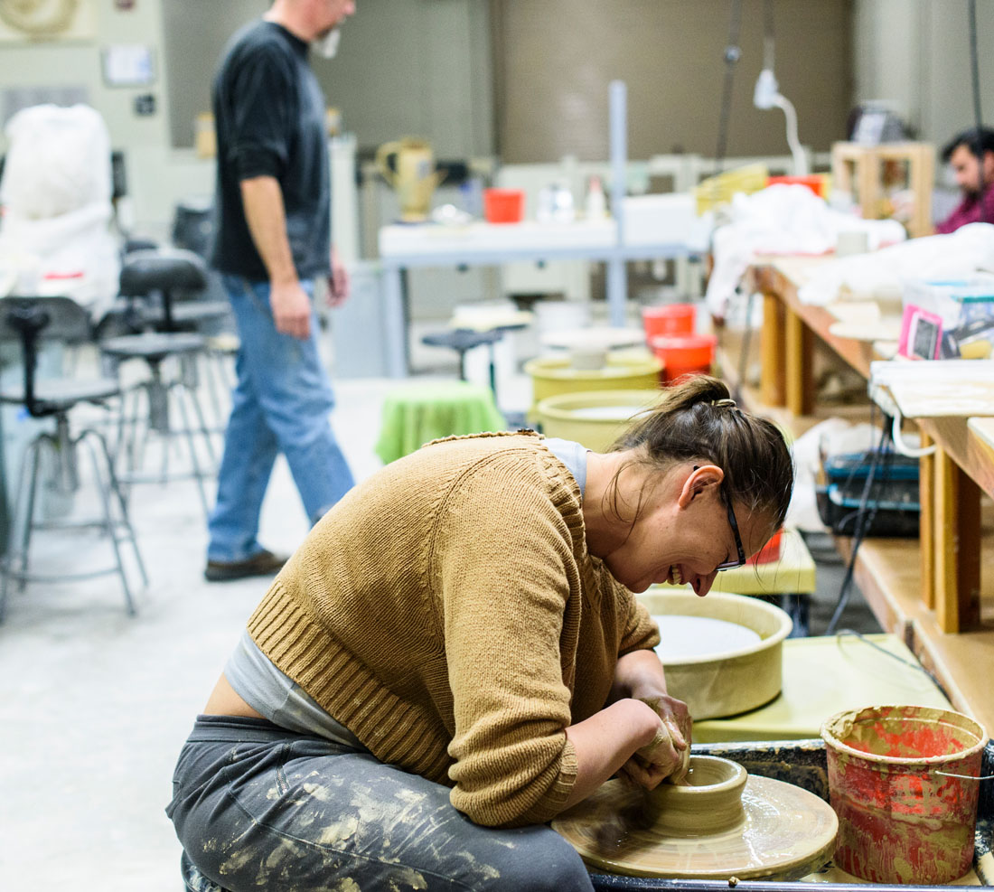 Student working on a ceramic
