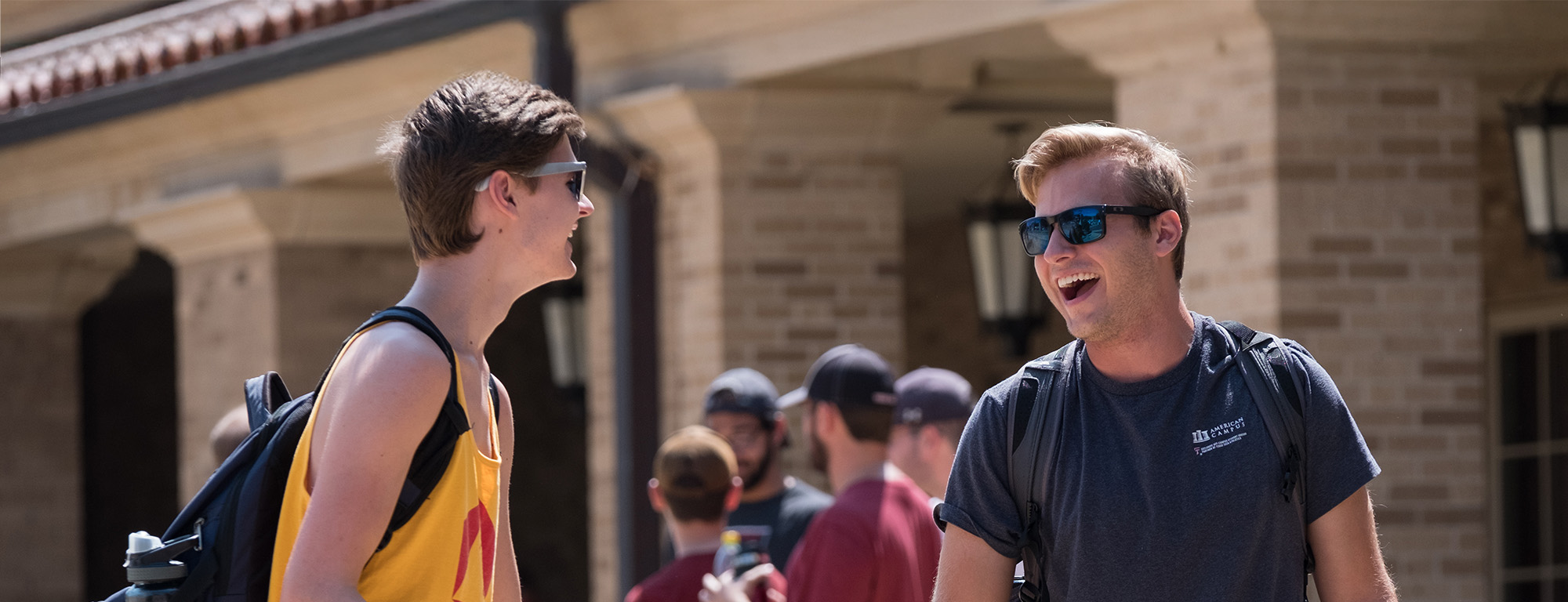 Texas Tech University students laughing and walking