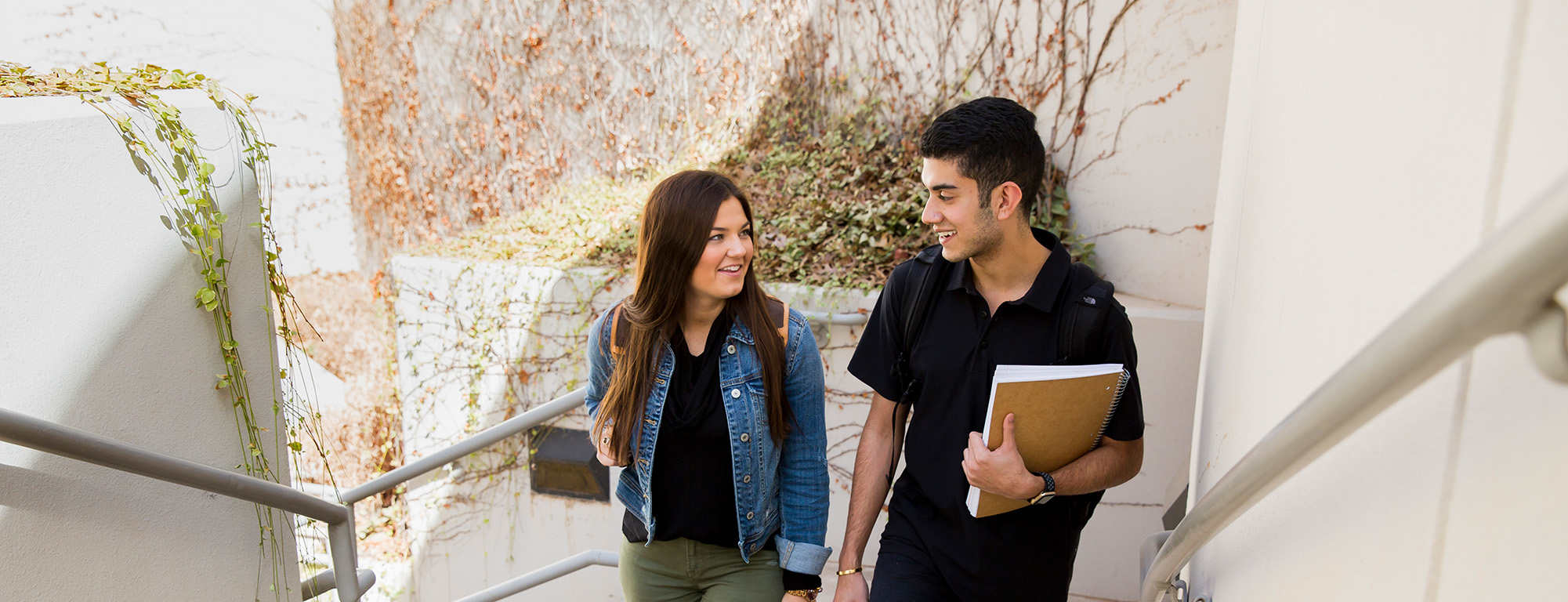 Texas Tech University student walking up stairs