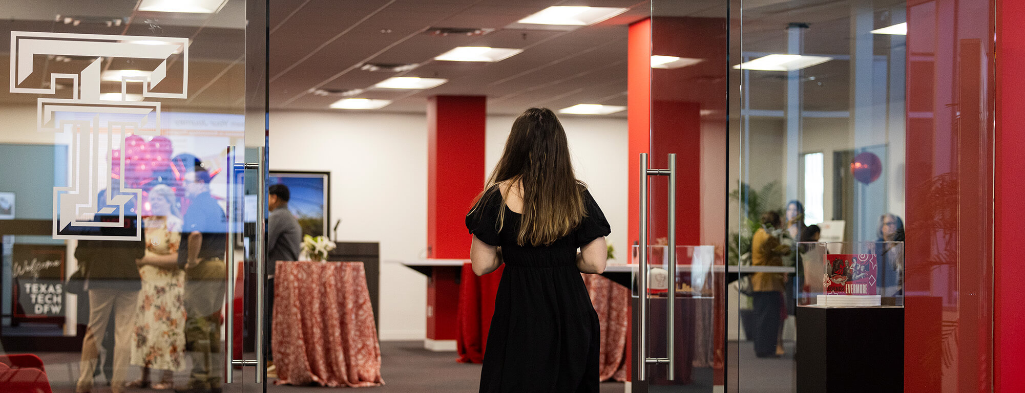 Texas Tech college of arts and sciences donor walking into conference hall