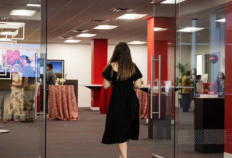 Texas Tech college of arts and sciences donor walking into conference hall