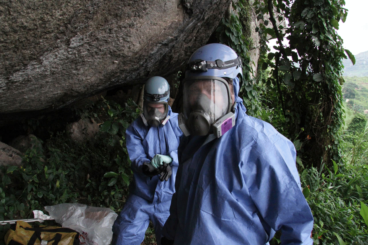 CDC ecologist and TTU alumnus Brian Amman enters a cave in Uganda