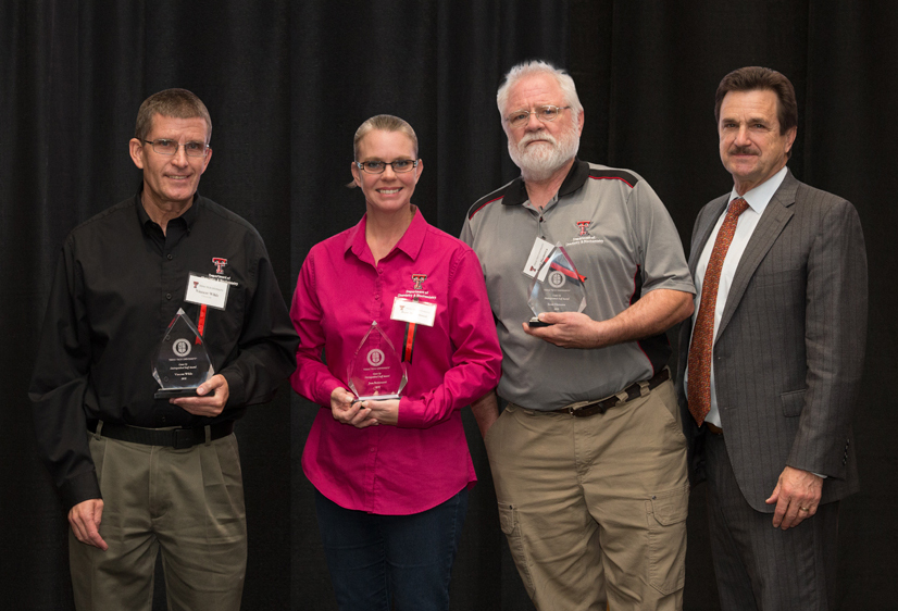 TTU Chemistry staffers Vincent Wilde, Jean Bertonazzi and Scott Hiemstra with TTU President Lawrence Schovanec