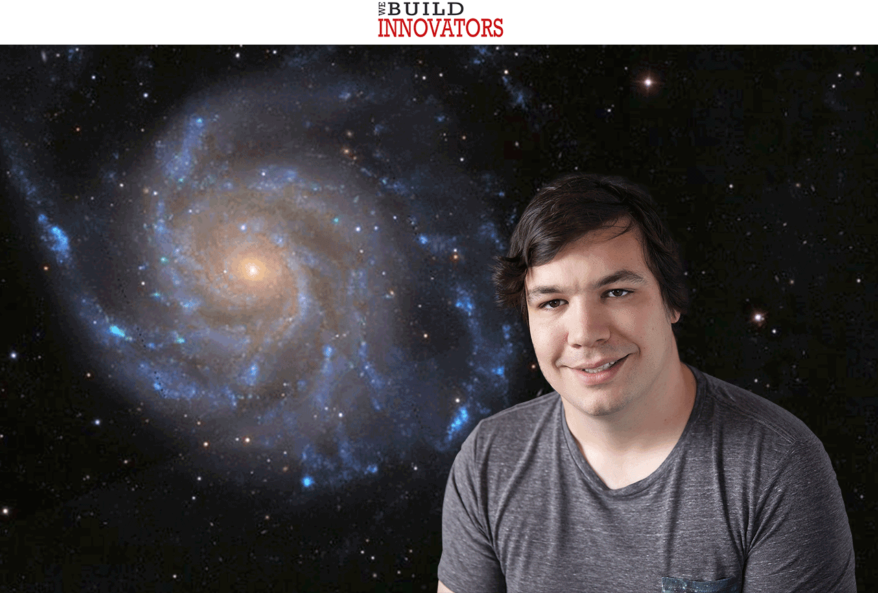 TTU astrophysics doctoral student Paul Bennet with image of Spiral Galaxy M101, galaxy image from Wikisky.org