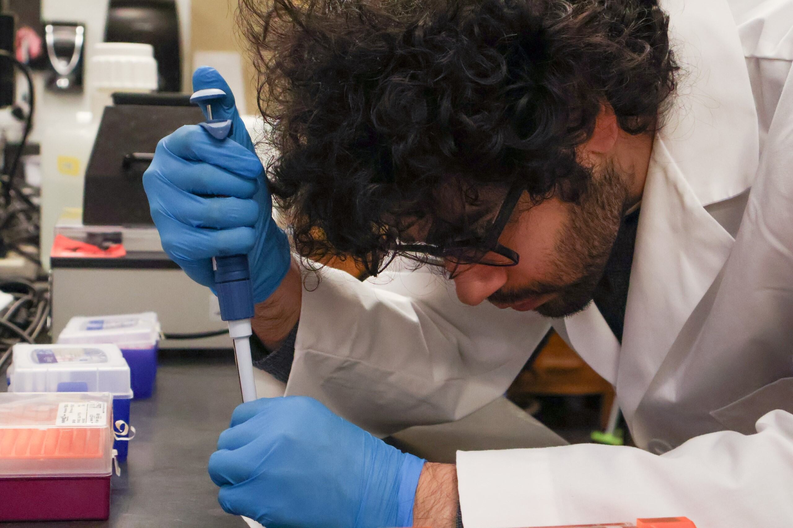 Student pipetting Student pipetting