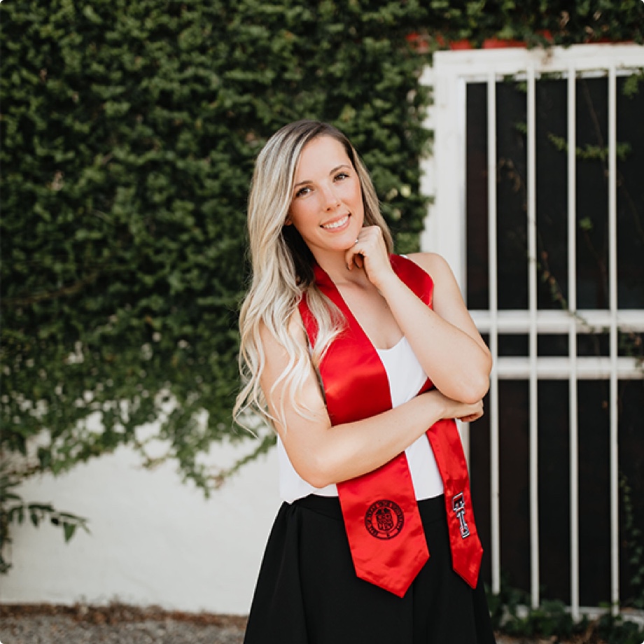 Photo of TTU student with red sash.