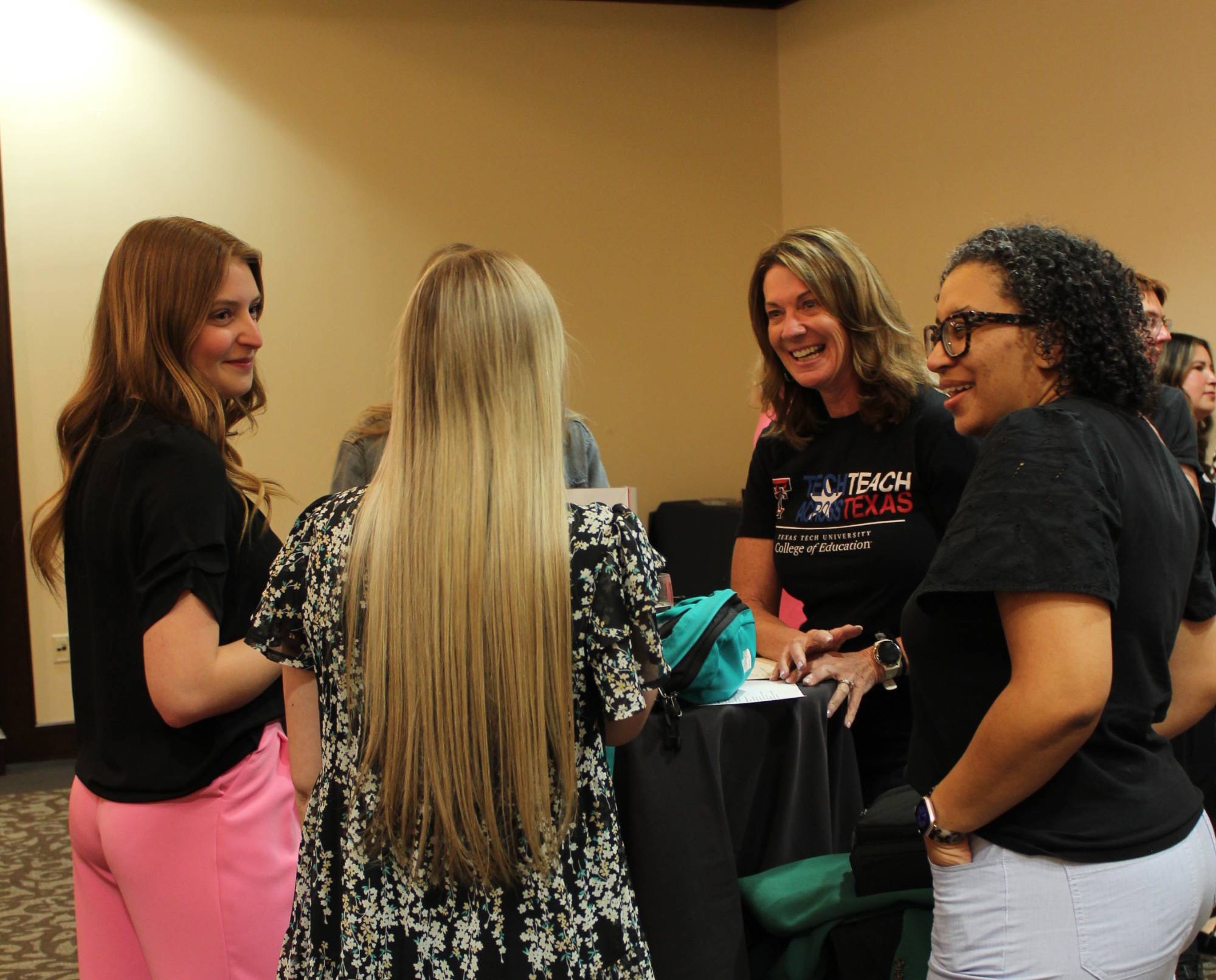 Students networking at fair