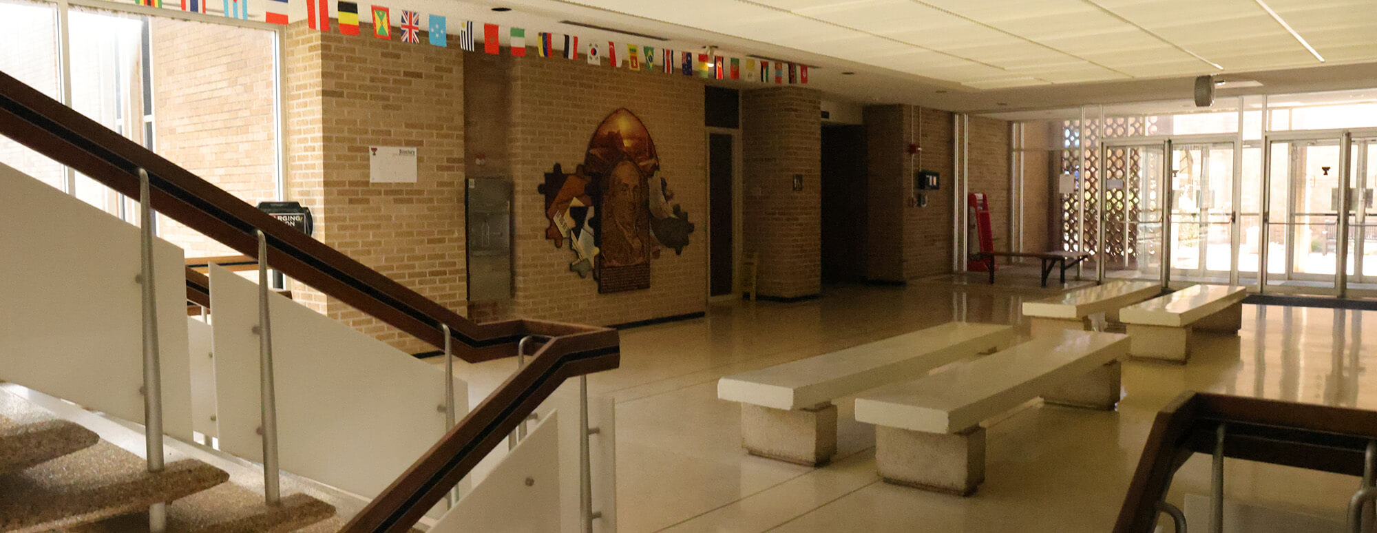 chairs and tables outside of student resource center in the CMLL building