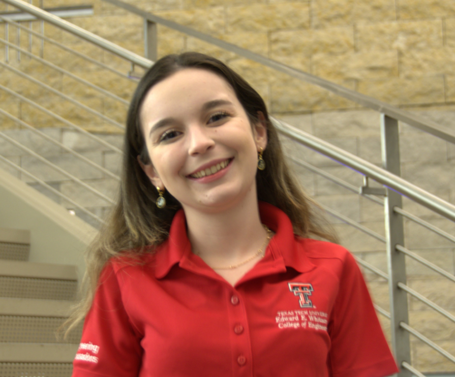 woman in red polo