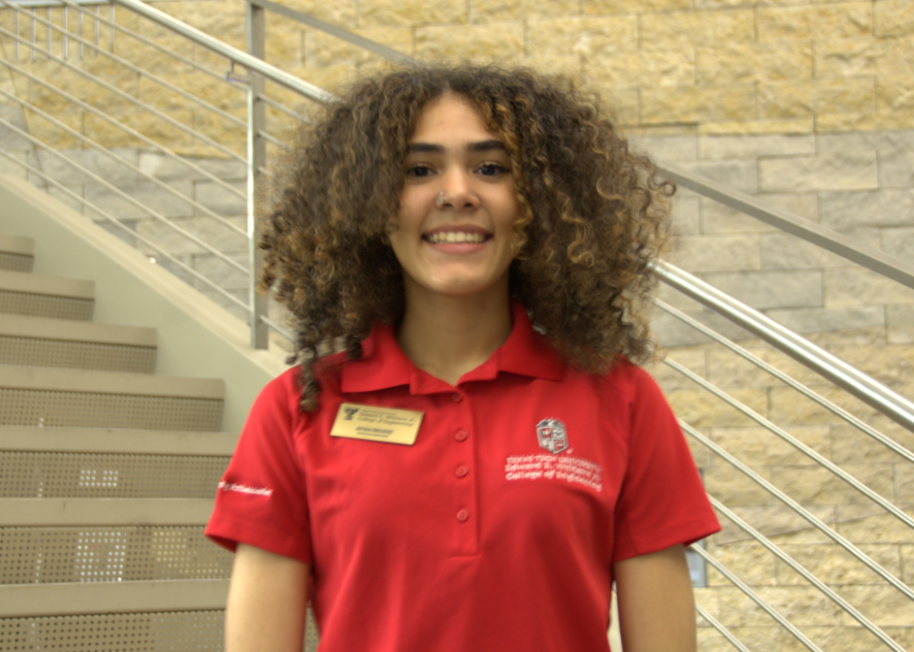 woman in red polo