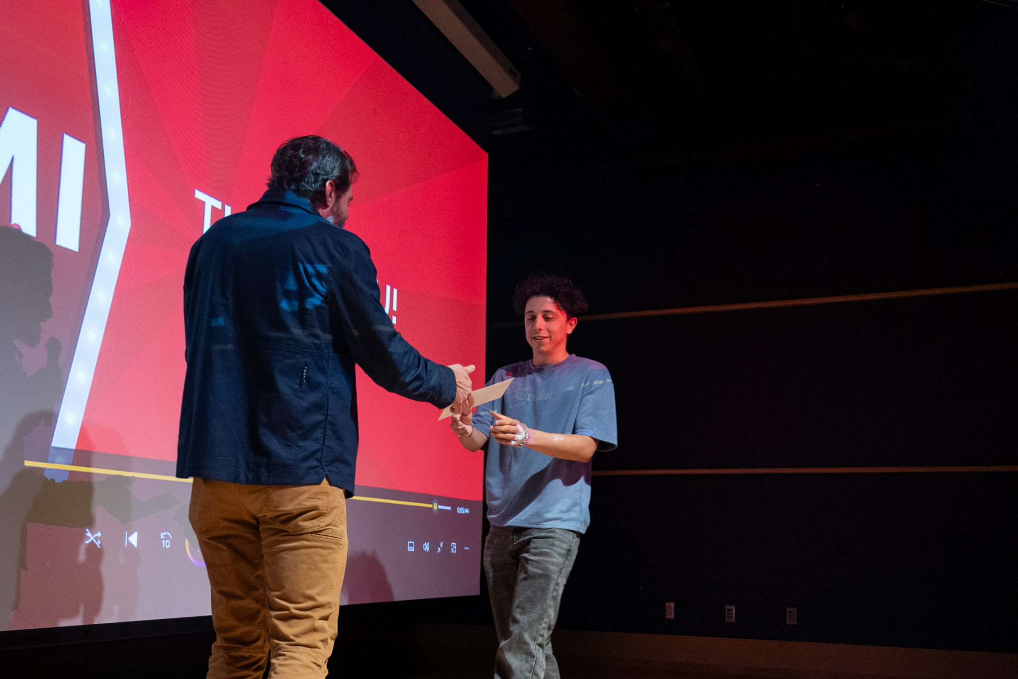 Student accepting award
