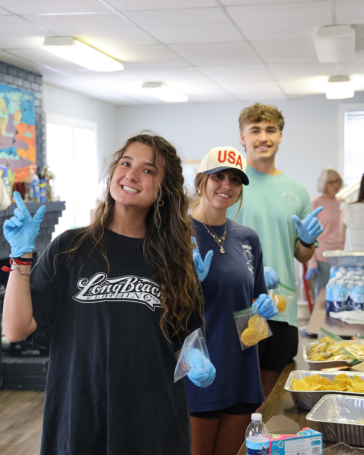 Students helping package meals