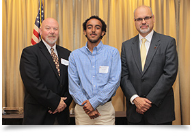 Todd Chambers, Ph.D., EMC student Dawit Haile and Dean Perlmutter