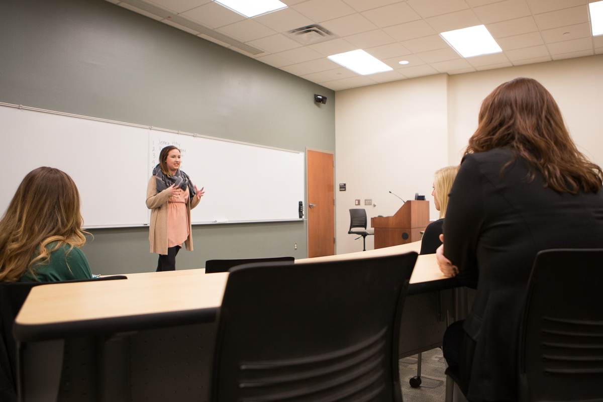 Student presenting their speech to the group