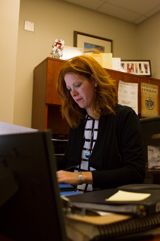 Debra working on her computer