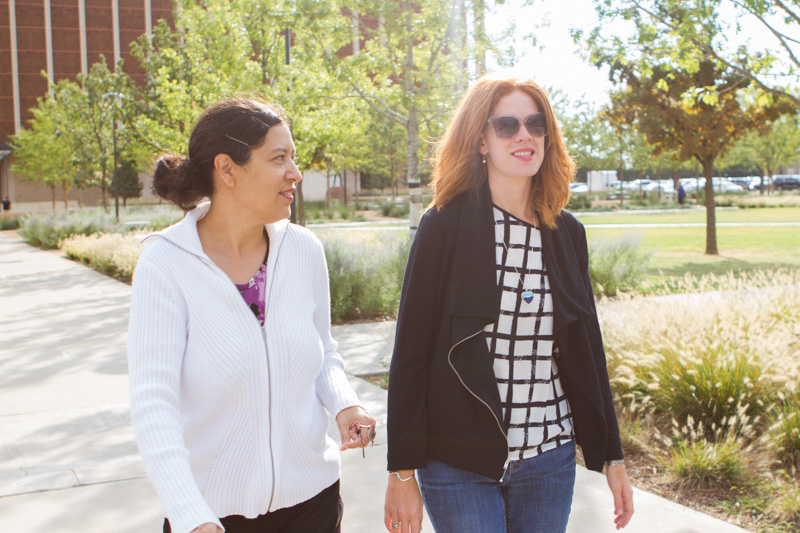 Debra and Rose taking a walk outside the building